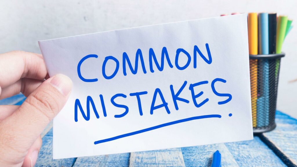 The word common mistakes written in blue on a white piece of paper.
