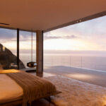 Modern bedroom overlooking ocean