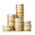 stacks of coins on a white isolated background